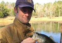 Theran Riedel holds a fish
